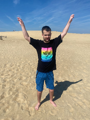 Evan climbing the dunes in OBX!